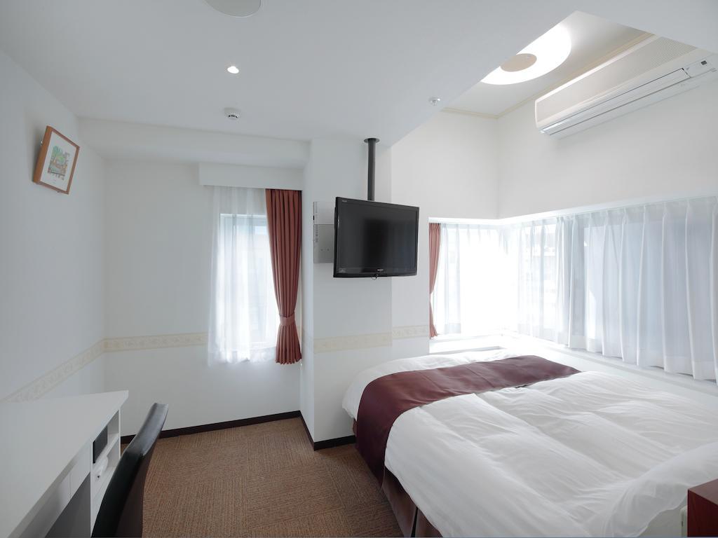 Hotel Check In Shijokarasuma à Kyoto Extérieur photo