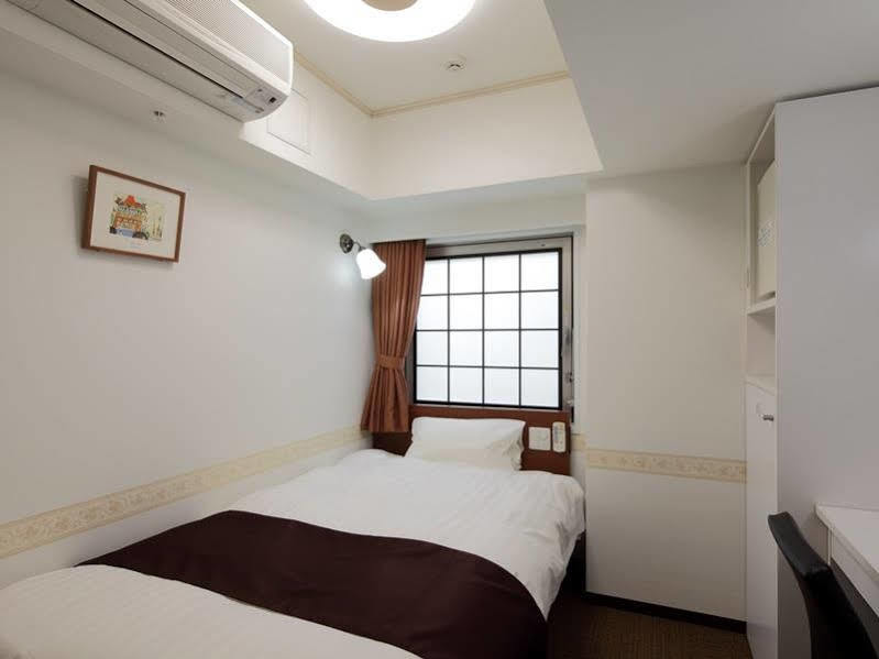 Hotel Check In Shijokarasuma à Kyoto Extérieur photo